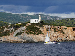 Lighthouse and yacht