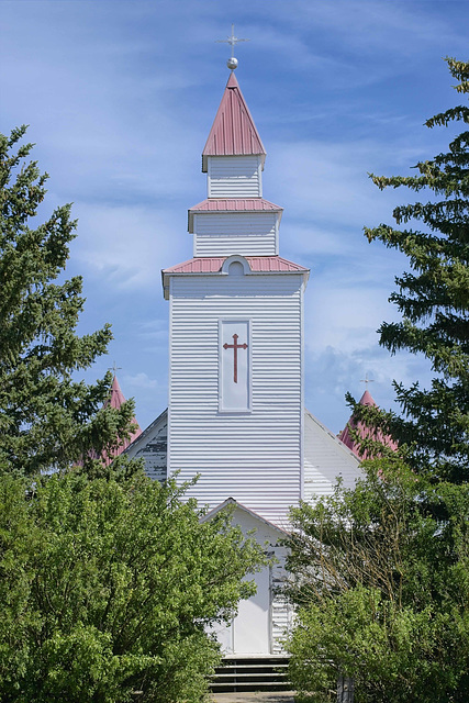 church framed by trees