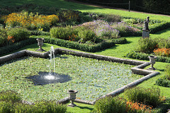 Ornamental pool with fountain statue at Lyme Park