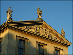 statues in a blue sky