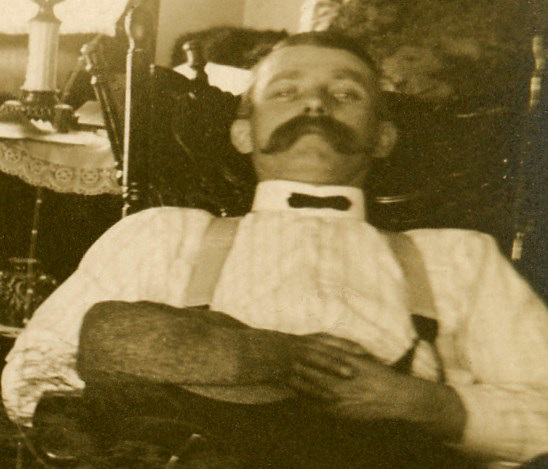 Man in Chair  - Detail of Parlor and Sitting Room, Elizabethtown, Pa., March 10, 1912