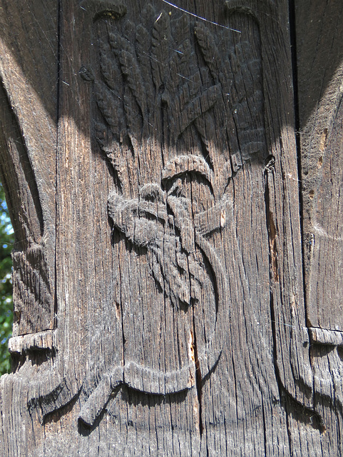 great dunmow church, essex, sickle cutting corn carved on tomb of thomas gibbons +1891