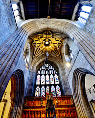 Arches, Windows and Canopy over the Font.