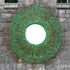 A mirrored roundel on the castle wall