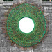 A mirrored roundel on the castle wall