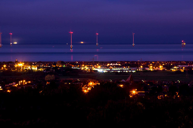 The wind farm at night.