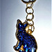 A blue glittery keyring cat