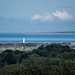 Looking from Thurstaston towards the Mersey Estuary, the tower is Leasowe lighthouse.