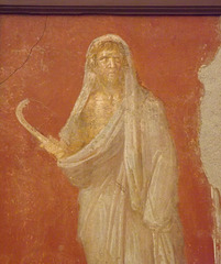 Detail of Saturn in a Winter Cloak Holding a Scythe Wall Painting in the Naples Archaeological Museum, June 2013
