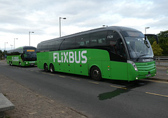 Whippet Coaches (Flixbus contractor) FX29 and FX33 at Trumpington - 23 Jul 2022 (P1120747)