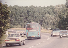 258/02 Premier Travel Services KVE 909P at Barton Mills - 19 Aug 1984