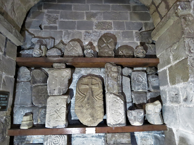 bakewell  church, derbs (65)c11 and c12 grave markers, c12 capitals and saxon fragments in the north aisle