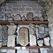 bakewell  church, derbs (65)c11 and c12 grave markers, c12 capitals and saxon fragments in the north aisle