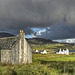 Derelict *croft house and passing storm, Staffin Bay, Trotternish, Isle of Skye