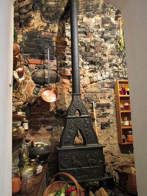 Firewood stove and ancient kitchen equipment.