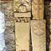 bakewell  church, derbs (92)recessed effigy amongst the cross slab collection in porch, mostly found when the late c13 /early c14 central tower was taken down.