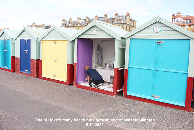 One of Hove’s many beach huts gets an end of season paint job 5 10 2023