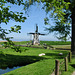 Windmill through trees Windmill through trees