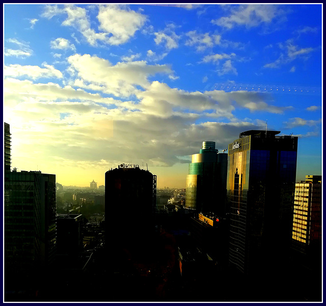 Another dawn shot through thick glass.