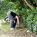 Emily and her daughter, Poppy, clearing the weeds
