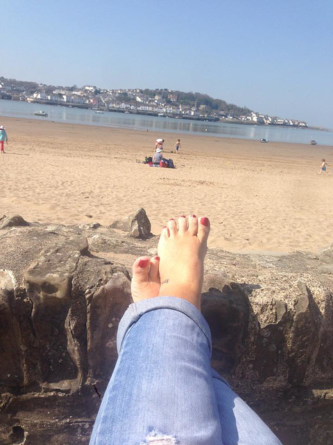 Warm enough for Mandi's tootsies to face the sun unwrapped