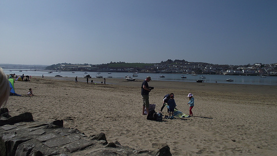 More people enjoying the sun on the beach