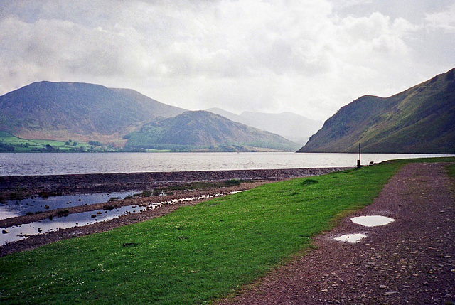 Wier at the western end of Ennerdale Water looking towards Angler's Crag (Scan from May 1990)