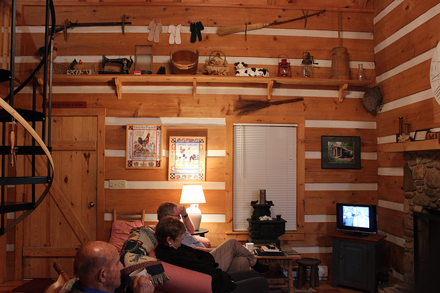 #2  )   Inside the mountain cabin....Our friends having a rest...rustic de'cor everywhere :)