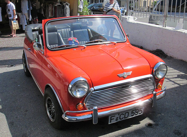 Mini Cooper convertible in hot orange...