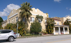 Seminole Inn by the half car passing by