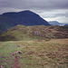 Looking back across Haystacks (597m) towards Ennerdale Water and Angler’s Crag just visible behind the dark form of Pillar in the centre (Scan from May 1990)