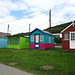 Some beach huts are very colourful