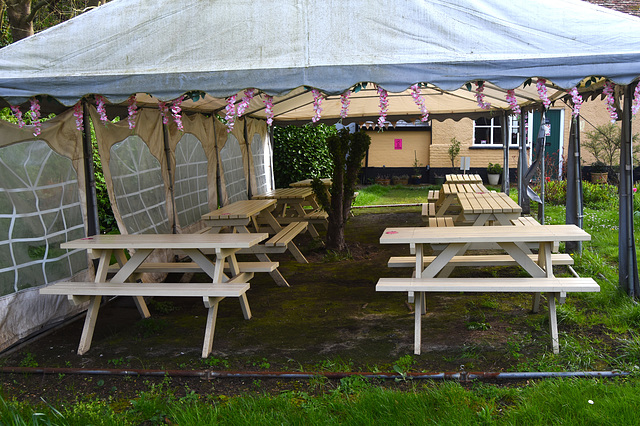 Some tables and benches in a cafe! Some tables and benches in a cafe!