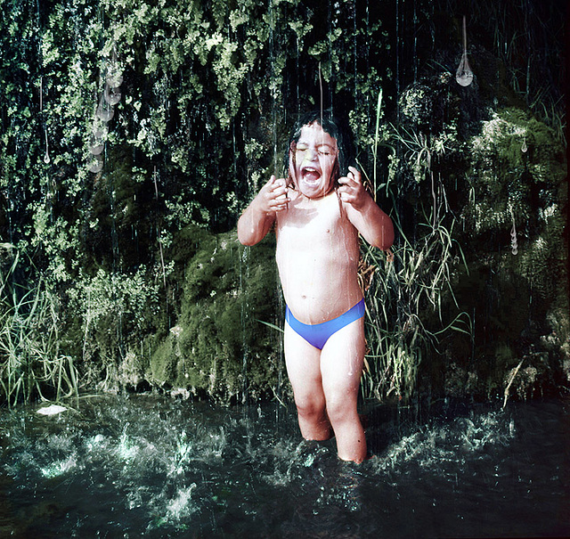 Smiling, no, laughing,  under a waterfall - Lima