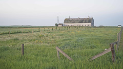 fences and barn in morning light