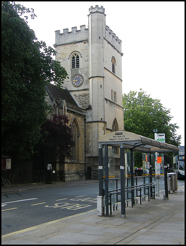church clock and bus stop