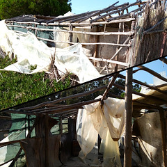 The hug, typical 20th century replica of the Obidos Lagoon Fishermen Hamlet, is in this embarrassing state