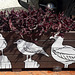 Street art on flowerbed.