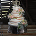 Photo # 6 ~~  Mr. and Mrs. Tucker's wedding cake..:))  Note:  the rather small cake did NOT last for the large number of guests.  ( approx 250 folks)