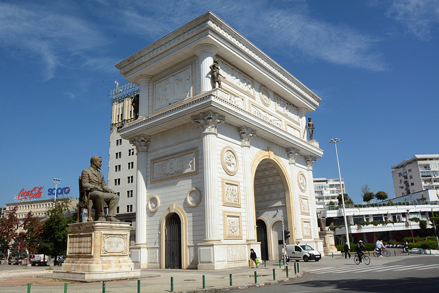 North Macedonia, Skopje, Macedonia Gate and Monument to Hristo Tatarchev at Right