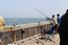 Fishing off pier at Tybee Island,   Savannah, Georgia  USA