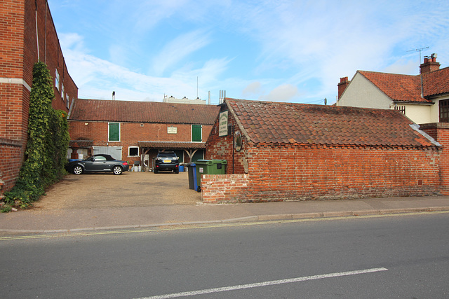 Outbuilding to The Green Dragon Inn, Broad Street, Bungay, Suffolk with brewery beyond