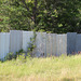 HFF!!  Oh My!!  Aluminum siding for a home,  but someone needed a fence ! :))