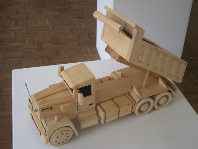 Wooden model of Volvo truck.