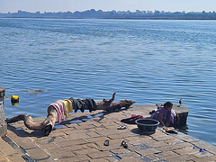 Drying laundry by the Narmada river at MAHESHWAR