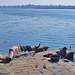 Drying laundry by the Narmada river at MAHESHWAR