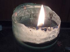 Read white candle in the Parroquia Santuario Nuestra Señora de Guadalupe , Lima, Peru