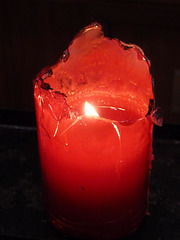 Red candle in the Parroquia Santuario Nuestra Señora de Guadalupe (, Lima, Peru)