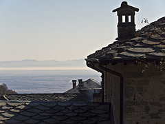 The roofs of Oropa, the plain and the hills of Oltrepo Pavese