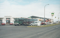 Austurleið-SBS coaches transferring passengers at Hella on services to Reykjavík. Dark red 502 going through, green 503 feeder from Ϸorsmork - 22 July 2002 (1715) (490-15)